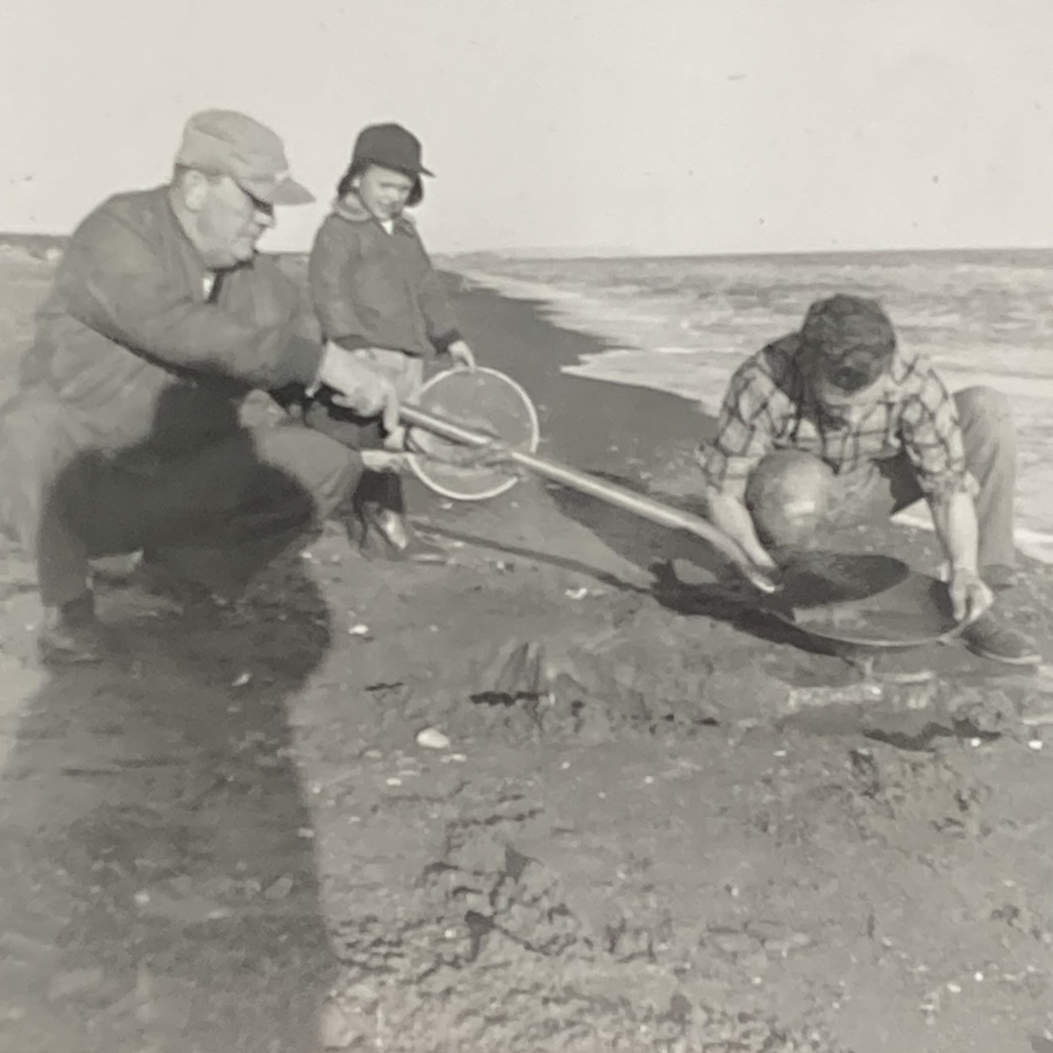 Panning for gold, probably on the beach at Nome.