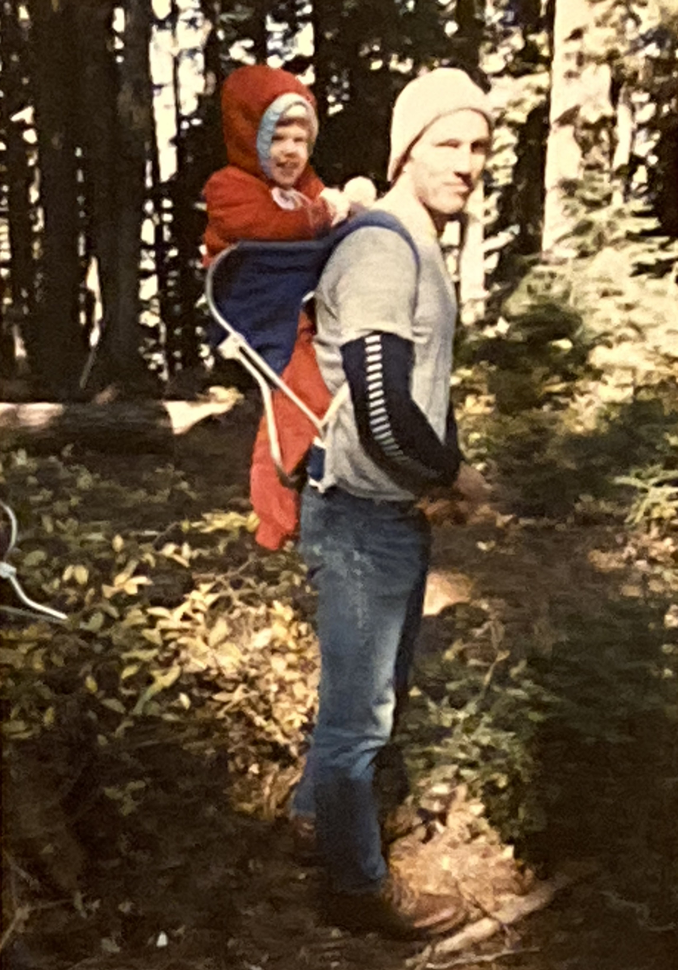 Mike carying Erika on an early hike.