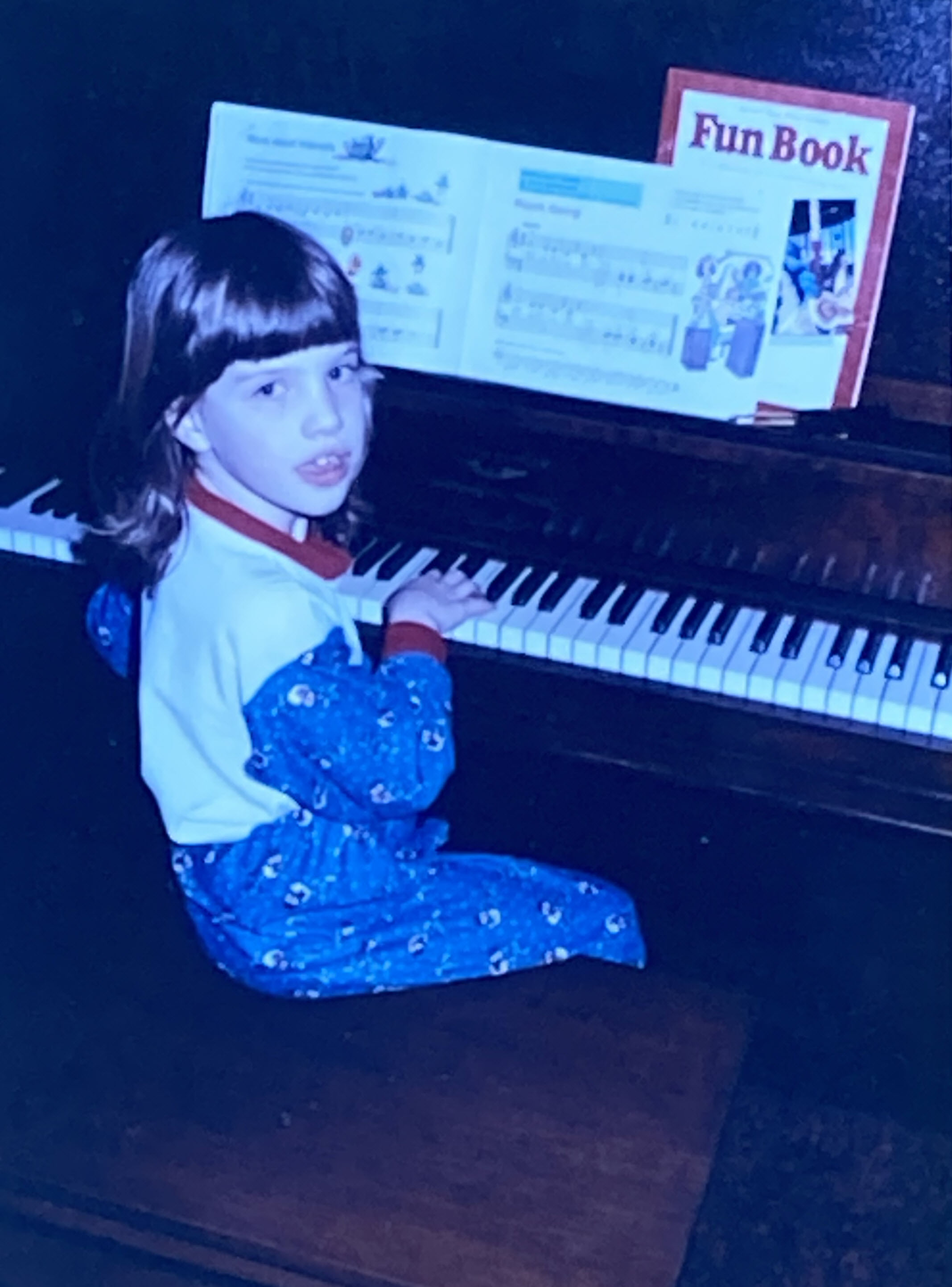 Erika at the piano at our house.