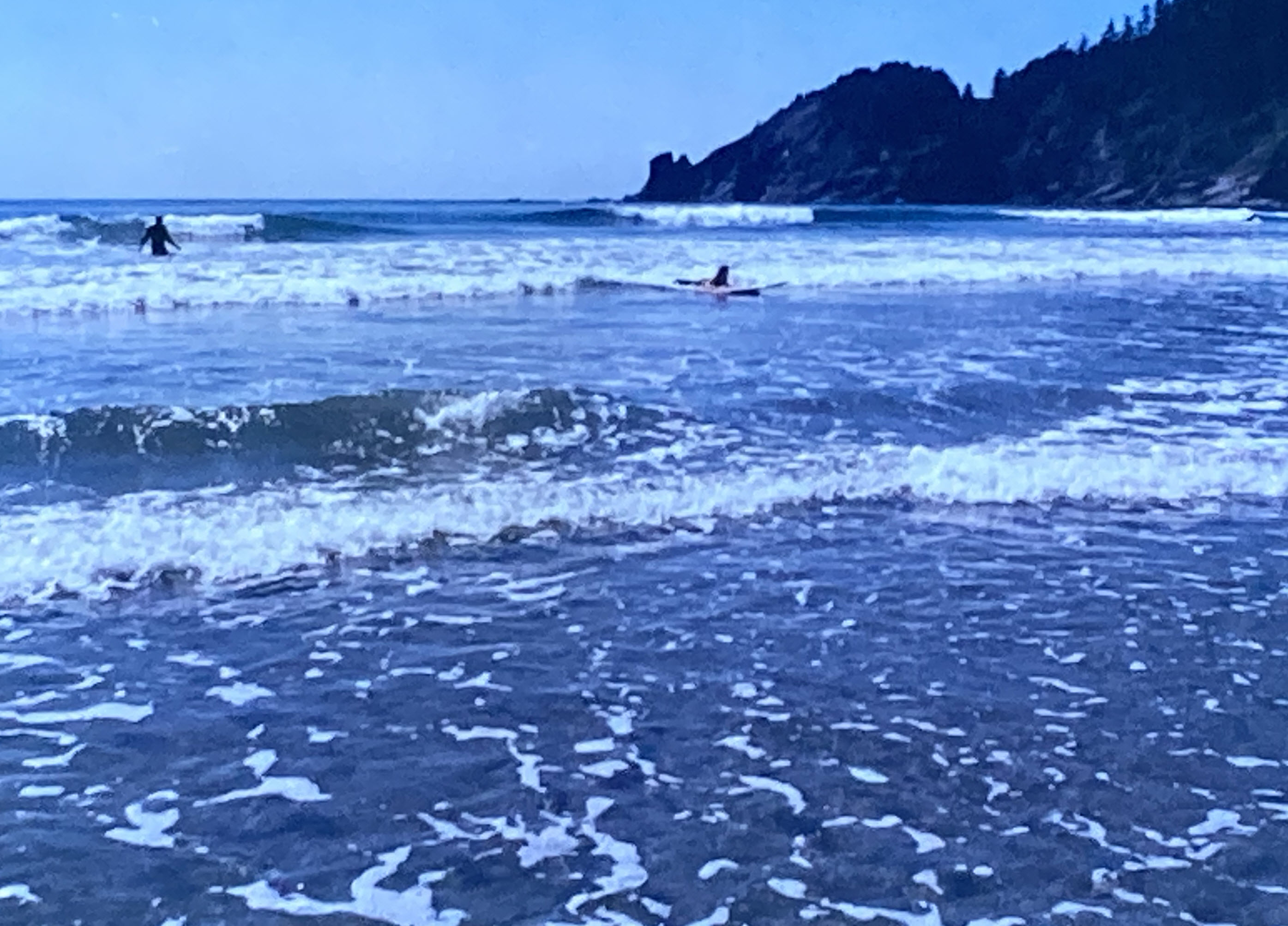 Kid surfing at Short Sands.