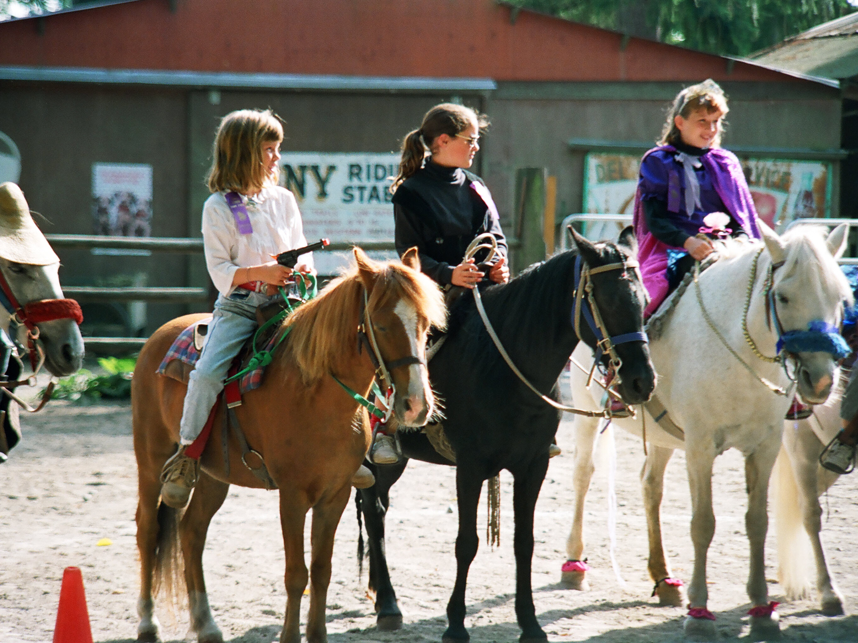 Erika, Ashley, and Kelsey at the pony rodeo.