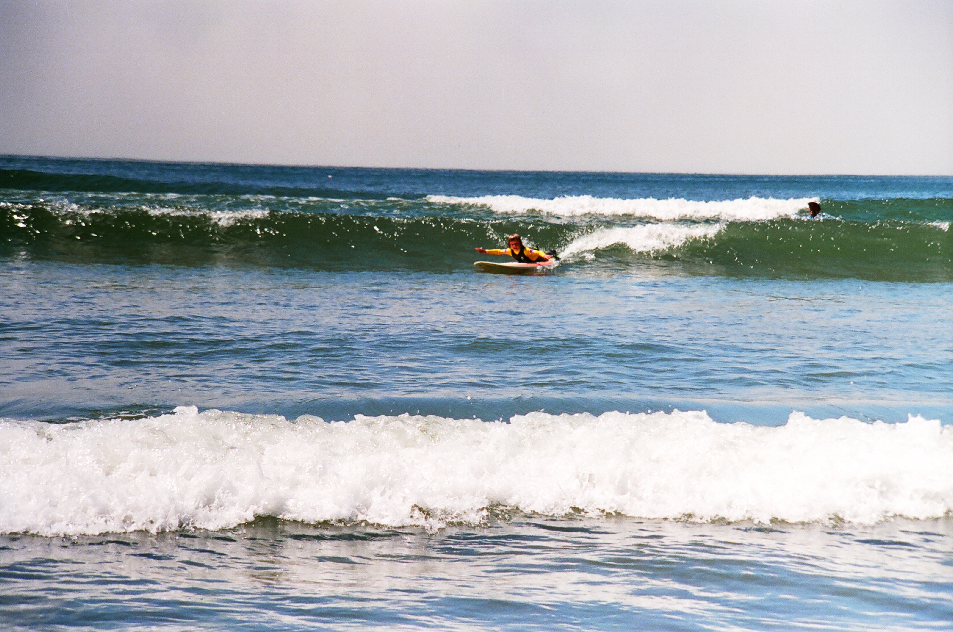 Kid surfing at Short Sands.