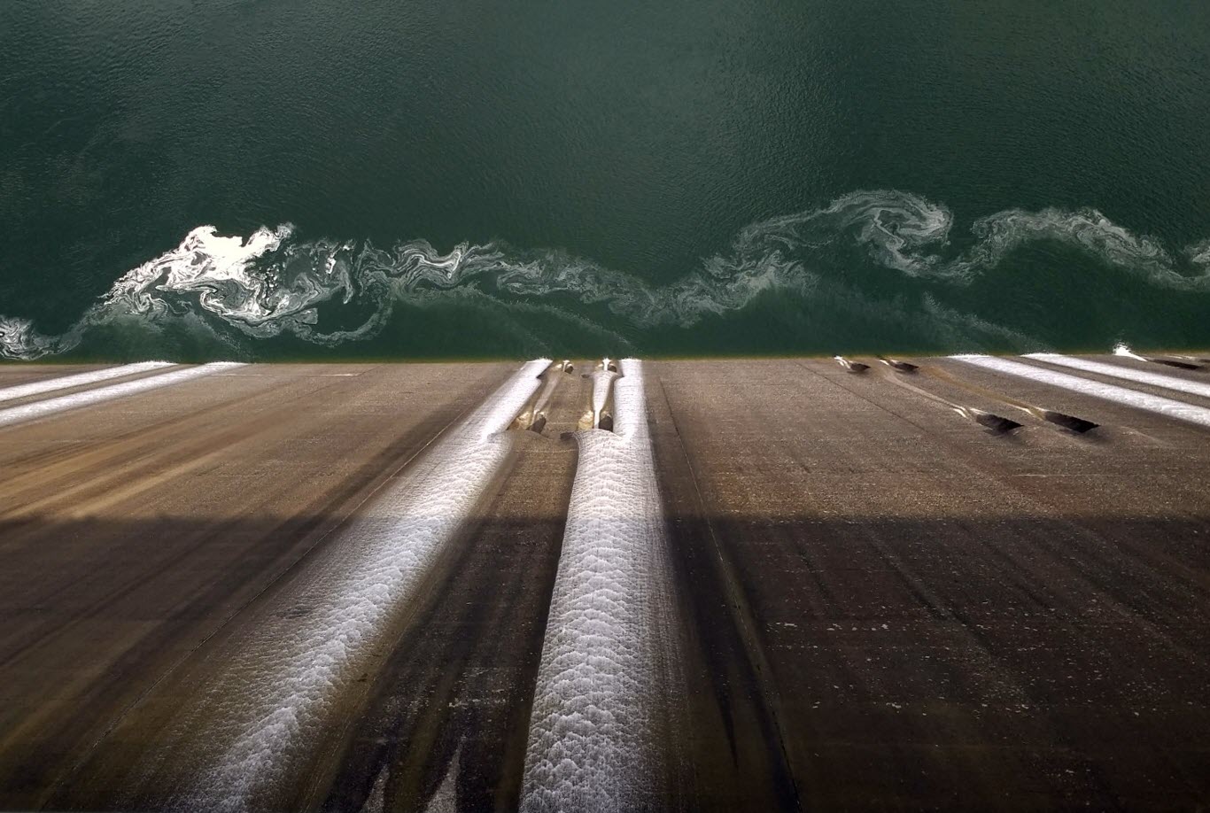 Looking down at the Grand Coulee Dam spillway.